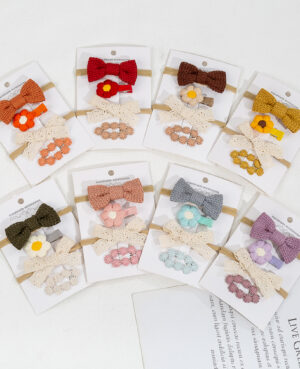 Set of baby hairclips in various colors and designs